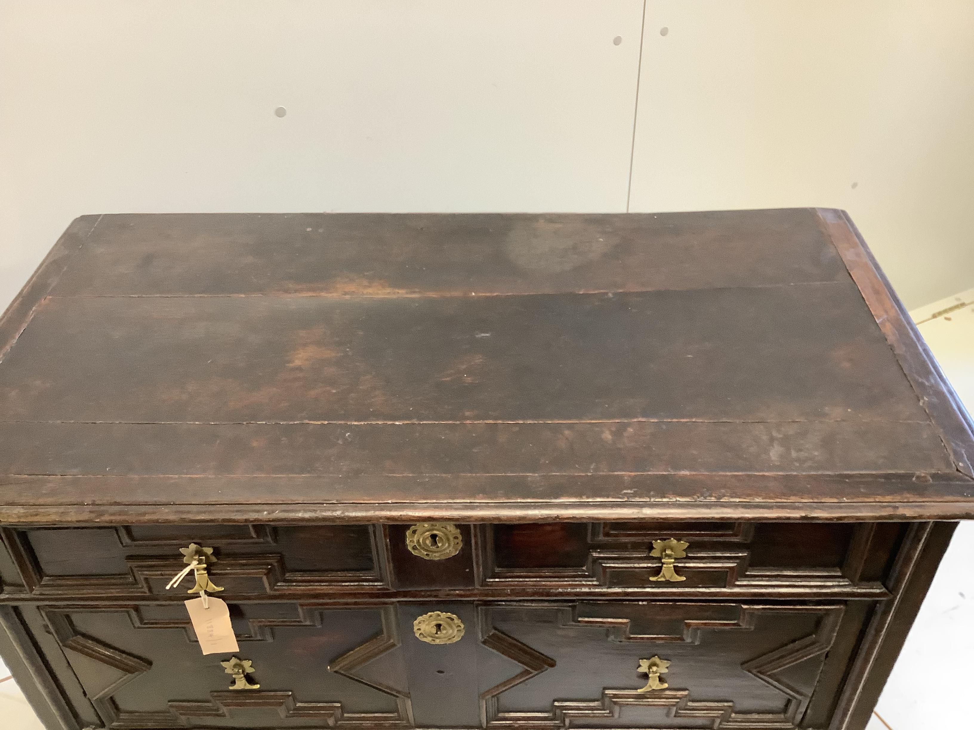 A late 17th /early 18th century oak four drawer chest, width 98cm, depth 50cm, height 86cm